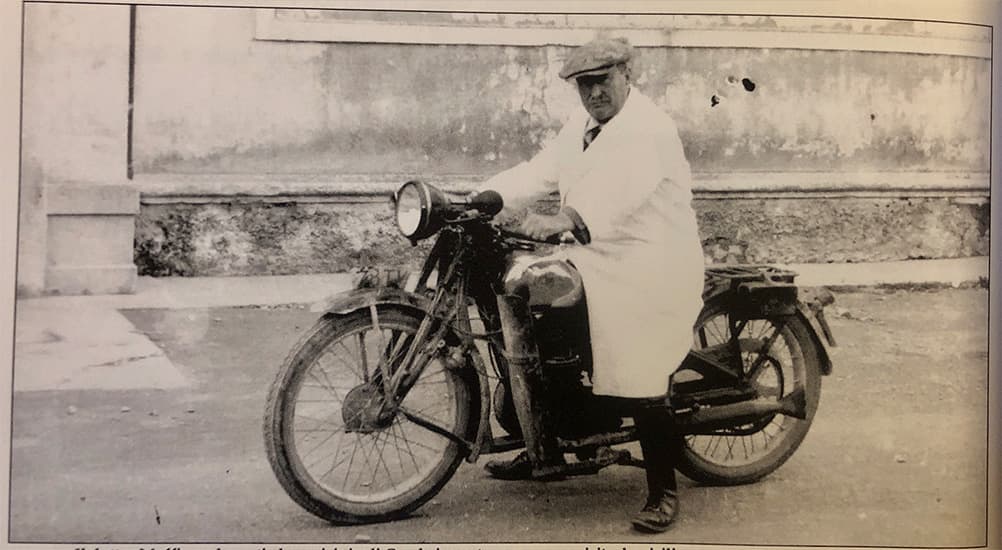 BDO_TheBiondoCompass_Doctor_Maffione_On_Motorcycle